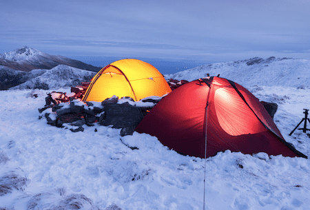 setup tent in snow